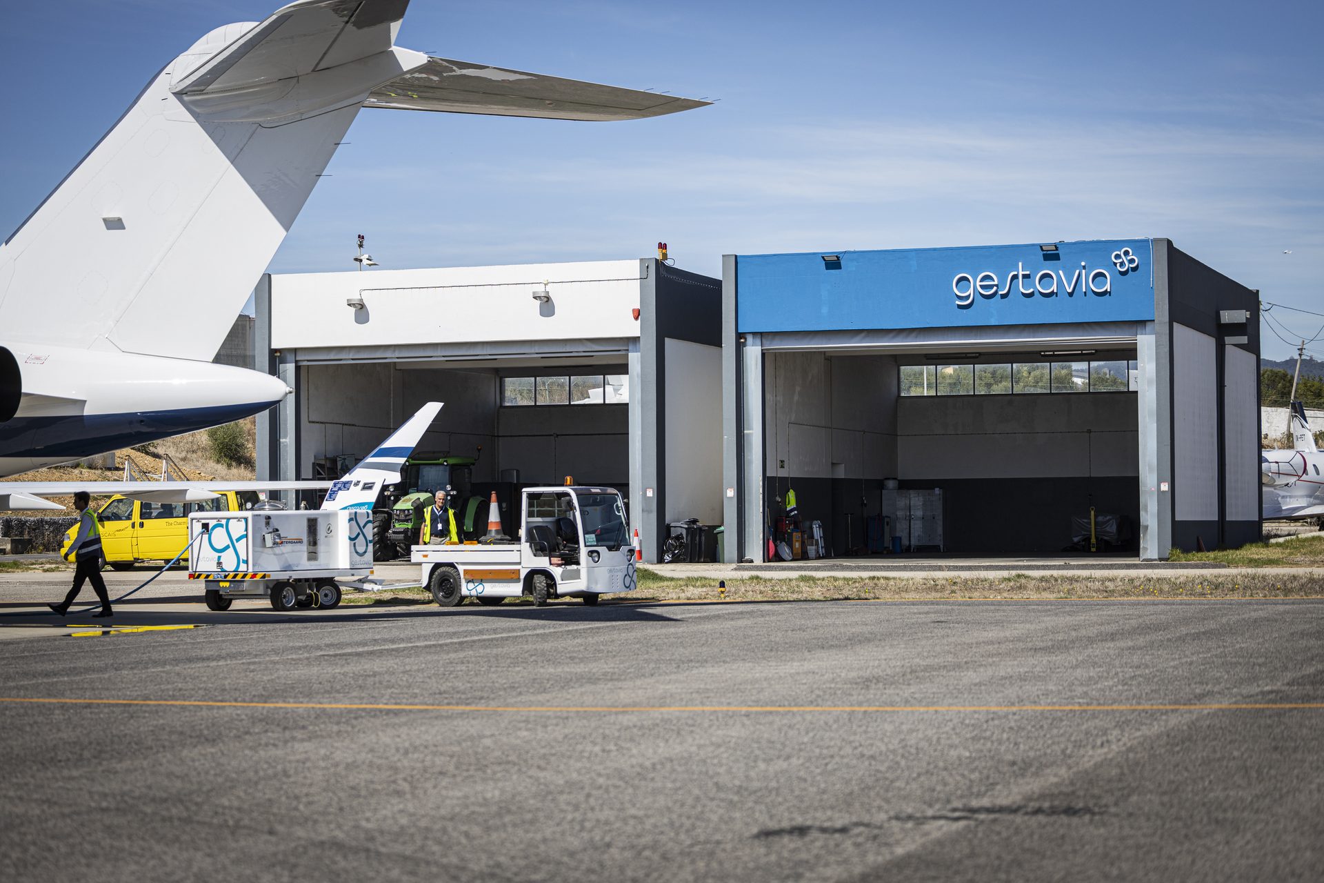 Gestavia hangar with aircraft and ground support equipment